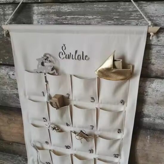 Canvas wall pocket calendar organizer with monthly layout and storage compartments