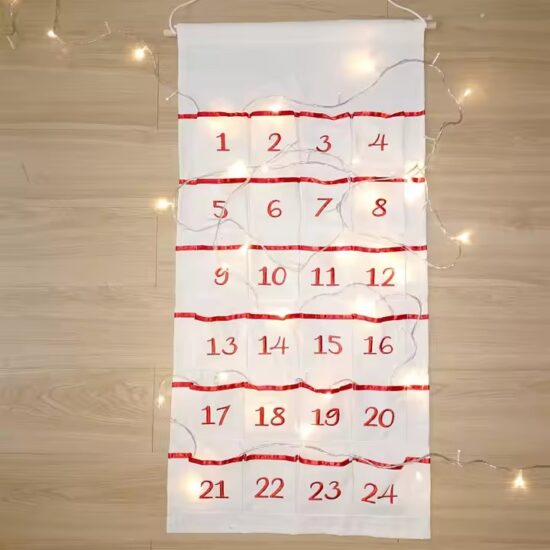 Canvas wall pocket calendar organizer with monthly layout and storage compartments