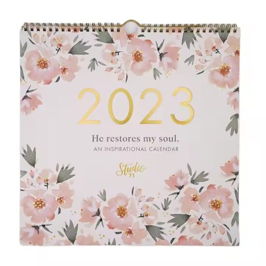 Colorful custom-printed family wall calendar with monthly planner layout