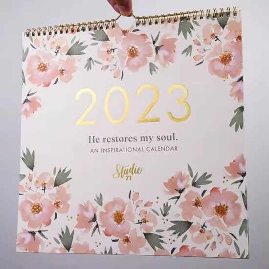 Colorful custom-printed family wall calendar with monthly planner layout